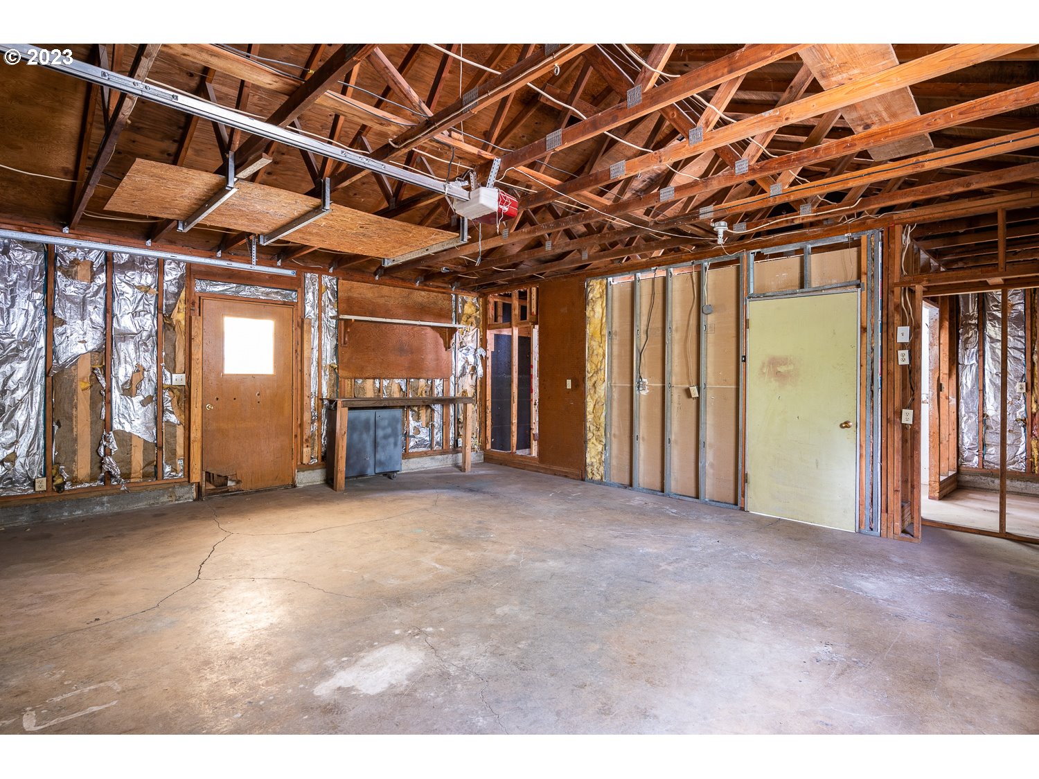 59191 Southeast Chalet Place Sandy, OR 97055 - Photo 18 of 25 a view of an empty room with a garage