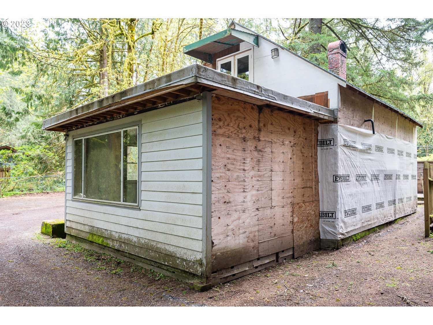 59191 Southeast Chalet Place Sandy, OR 97055 - Photo 20 of 25 a view of a house with a yard