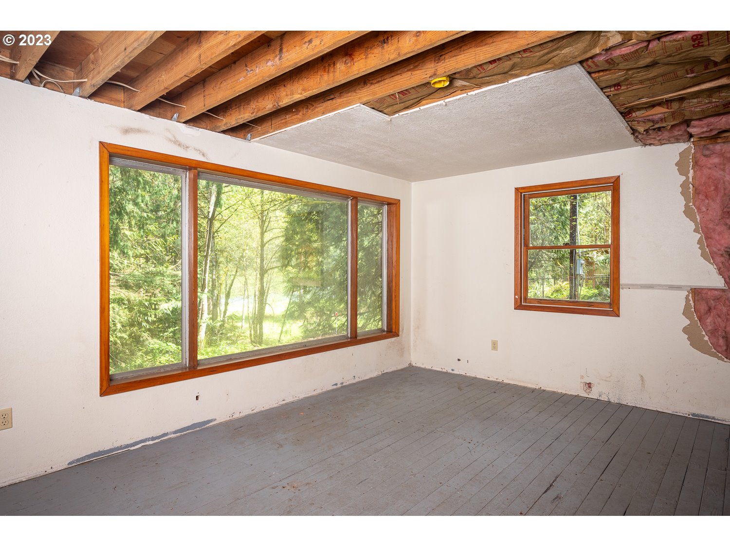 59191 Southeast Chalet Place Sandy, OR 97055 - Photo 9 of 25 a view of an empty room with a window