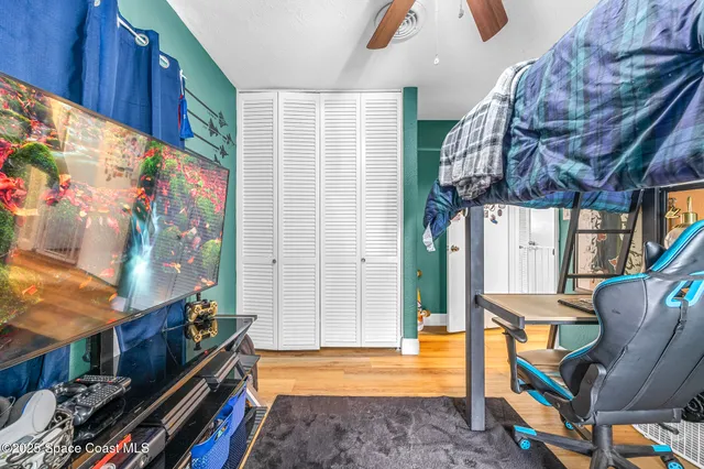 a view of an entryway with wooden floor