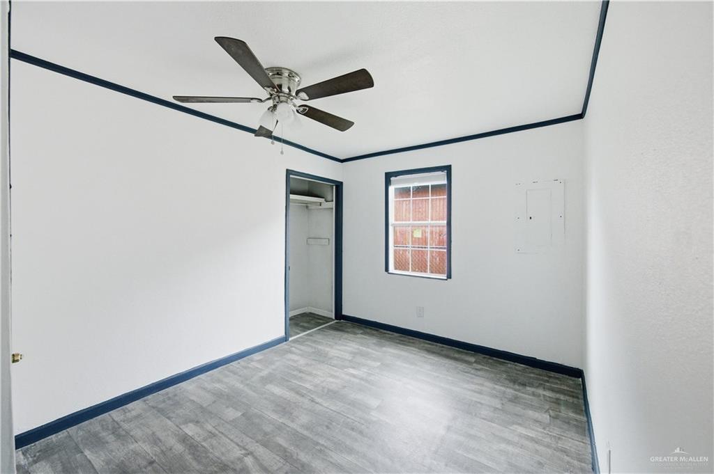 715 East Rusty Drive Pharr, TX 78577 - Photo 10 of 14 a view of an empty room with a window