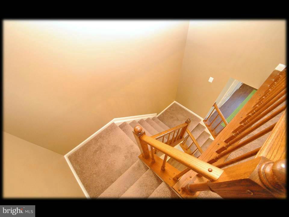 3738 Foxford Stream Road Baltimore, MD 21236 - Photo 20 of 25 STAIRS FROM UPPER LEVEL