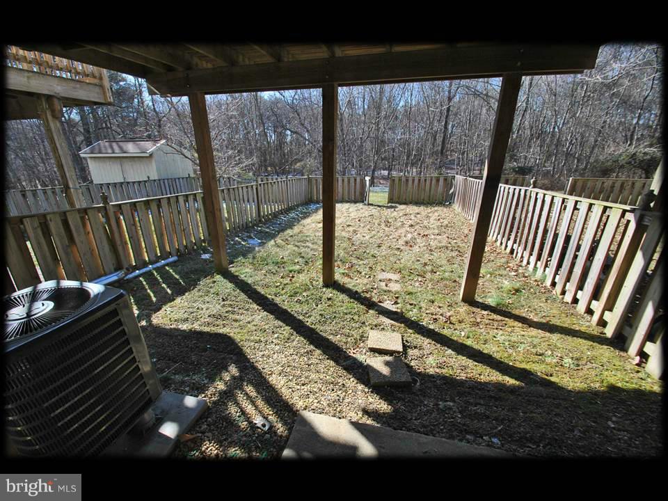 3738 Foxford Stream Road Baltimore, MD 21236 - Photo 23 of 25 FULLY FENCED IN REAR YARD (WALKOUT BASEMENT)