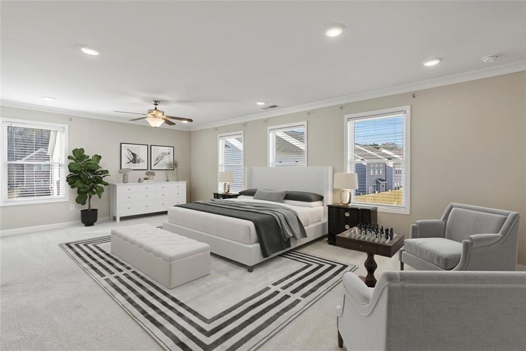 3739 Silvery Way Powder Springs, GA 30127 - Photo 14 of 28 a spacious bedroom with a bed and window