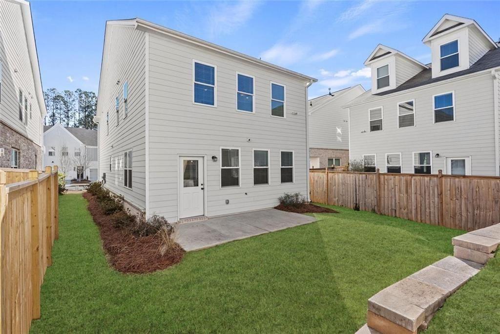 3739 Silvery Way Powder Springs, GA 30127 - Photo 23 of 28 a view of a back yard of the house
