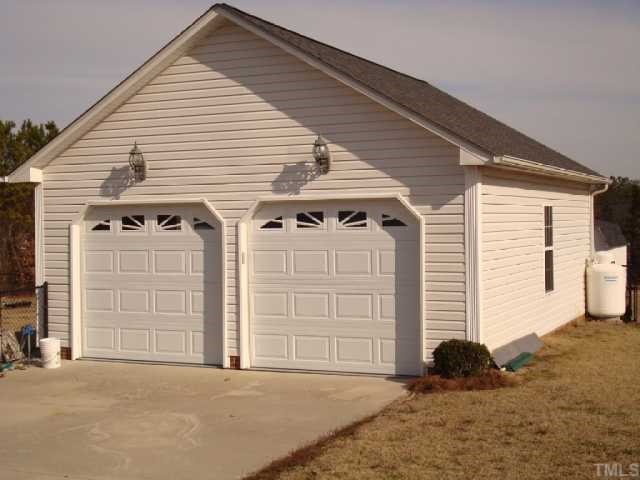 98 Line Drive Raleigh, NC 27603 - Photo 2 of 12 24x28 shop/garage Heated, Wired, and rough plumbed!