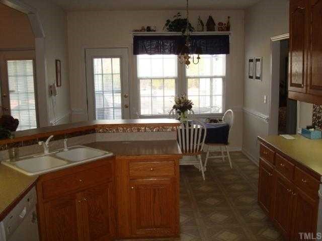 98 Line Drive Raleigh, NC 27603 - Photo 8 of 12 Kitchen view to breakfast area.