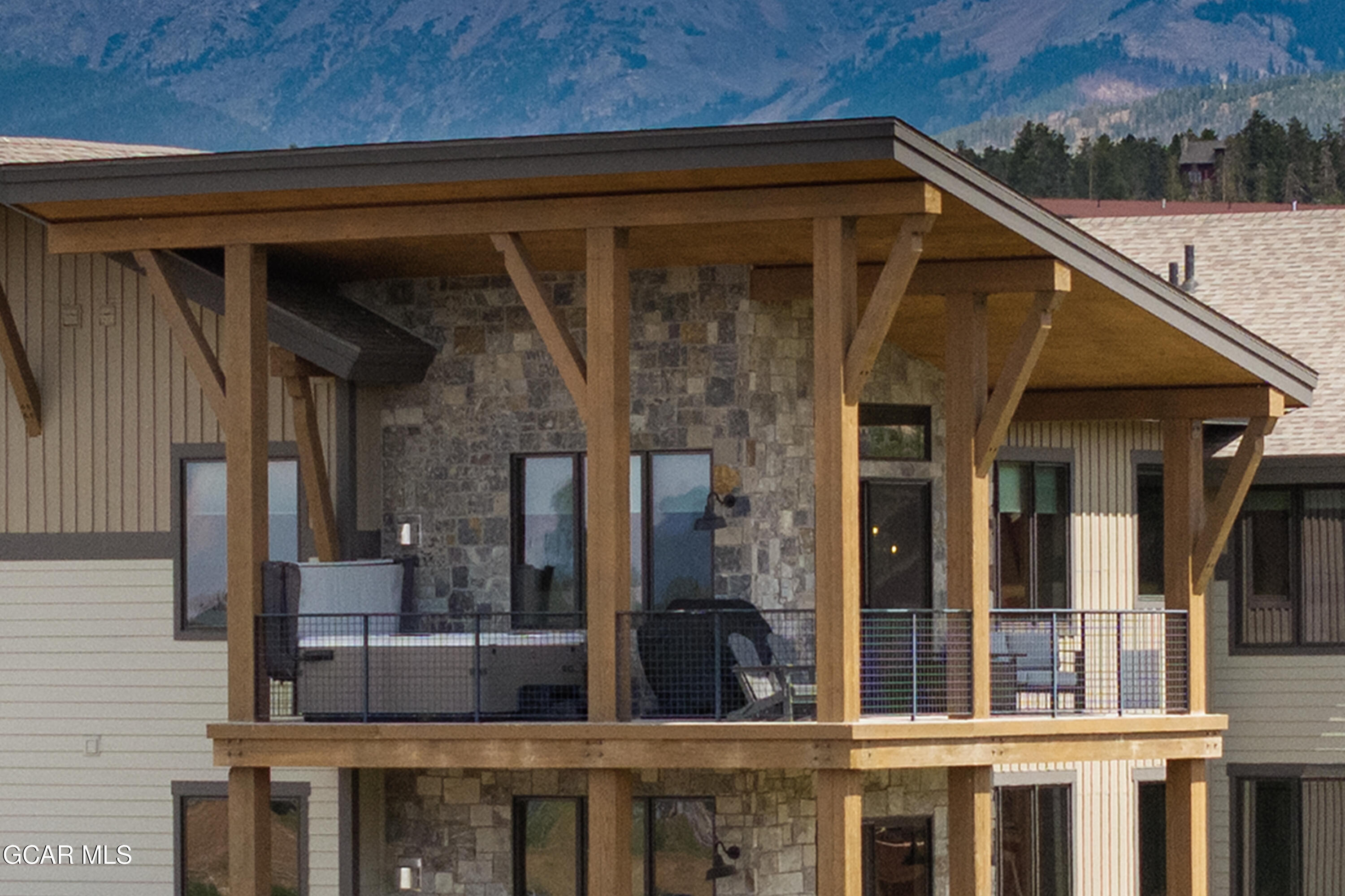 96 Meadow Trail, Unit G304 Fraser, CO 80442 - Photo 2 of 37 a view of balcony and deck