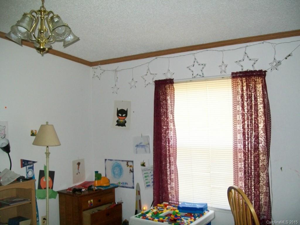 621 Sandifer Road York, SC 29745 - Photo 20 of 22 a bedroom with a bed and a window