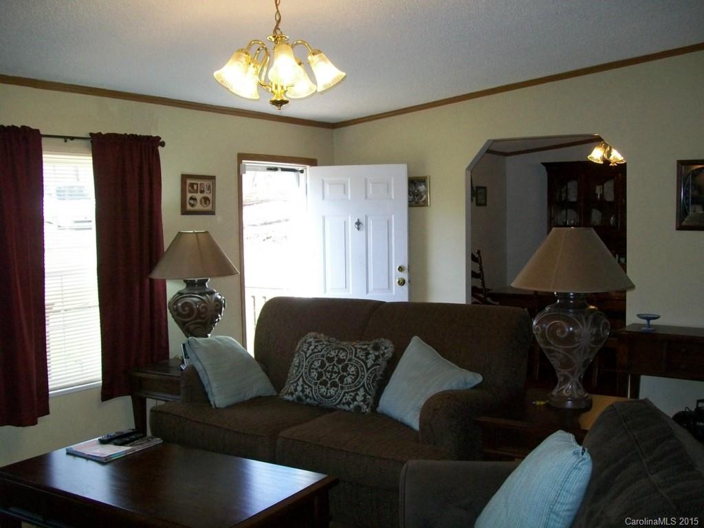 621 Sandifer Road York, SC 29745 - Photo 7 of 22 a living room with furniture and a chandelier