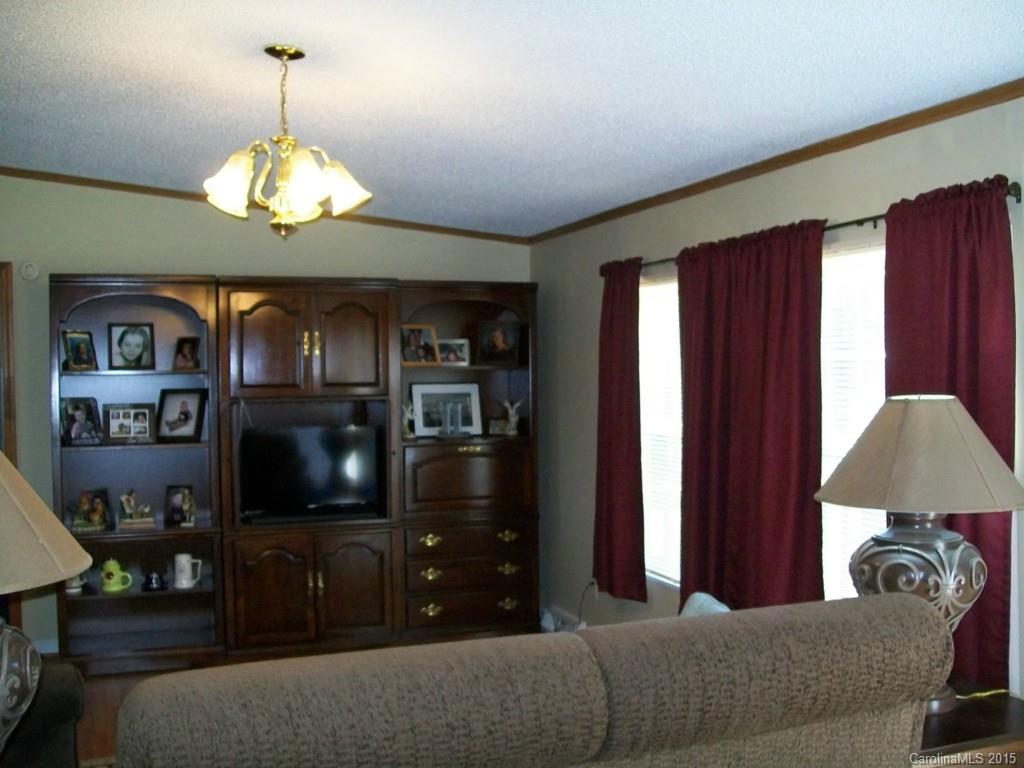 621 Sandifer Road York, SC 29745 - Photo 8 of 22 a living room with furniture and a flat screen tv