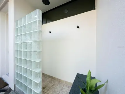 a view of a living room with cabinets