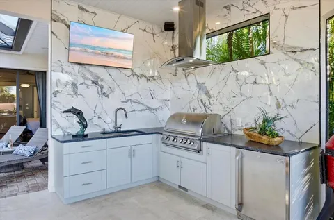a utility room with cabinets