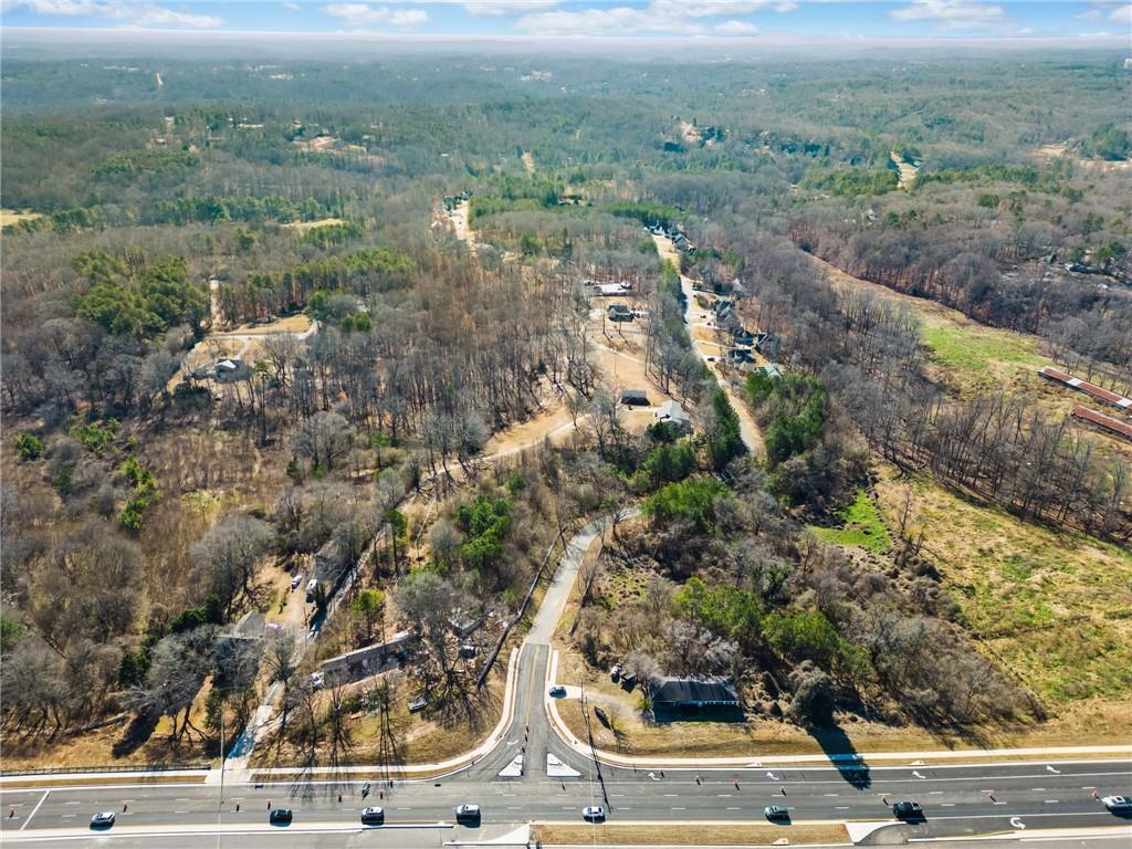 3320 Cumming Highway Canton, GA 30115 - Photo 2 of 2 an aerial view of residential houses with outdoor space and trees
