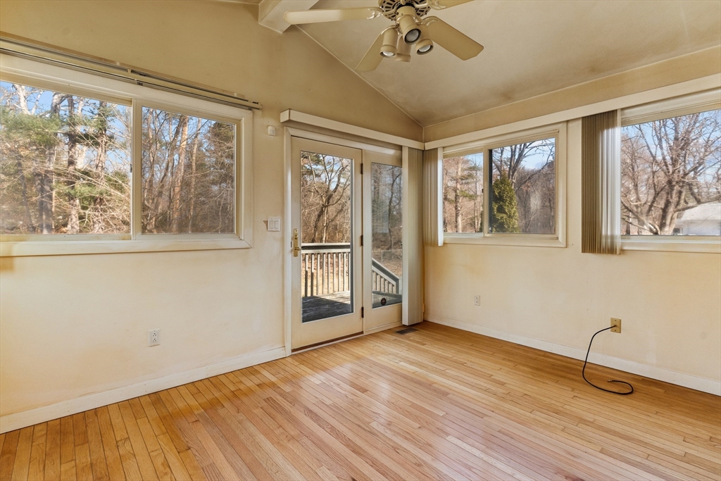 20 Joyce Road Framingham, MA 01701 - Photo 14 of 42 a view of an empty room with a window and wooden floor