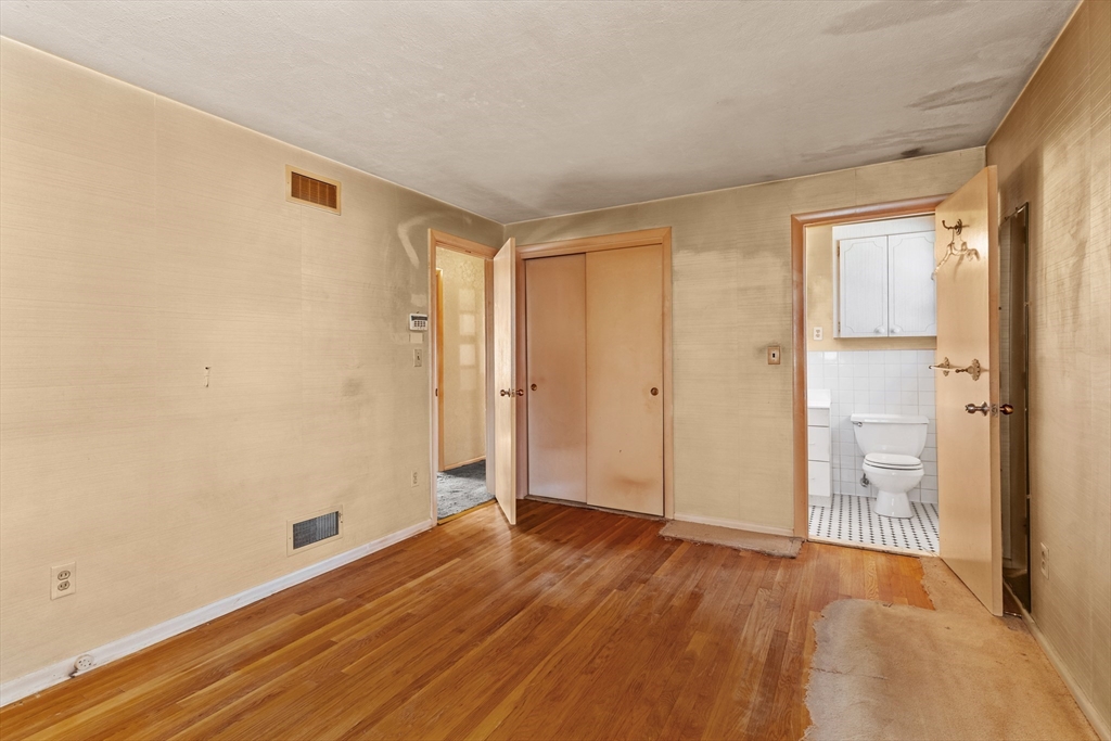 20 Joyce Road Framingham, MA 01701 - Photo 17 of 42 a view of an empty room with wooden floor