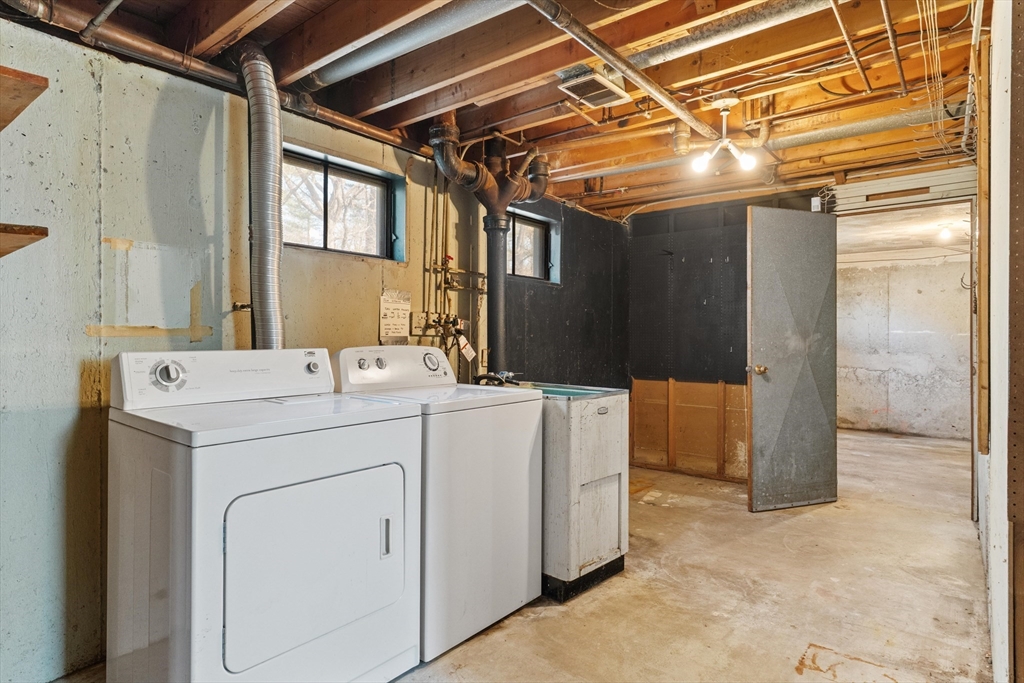 20 Joyce Road Framingham, MA 01701 - Photo 29 of 42 a utility room with dryer and washer