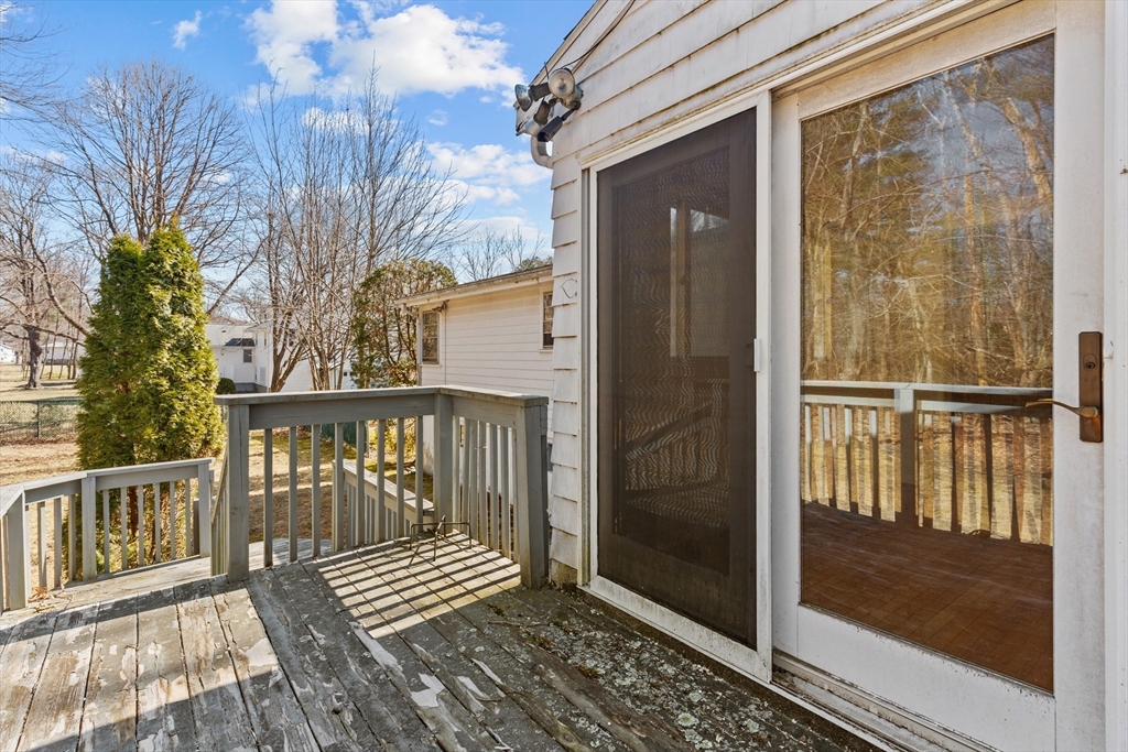 20 Joyce Road Framingham, MA 01701 - Photo 31 of 42 a view of a balcony with wooden floor
