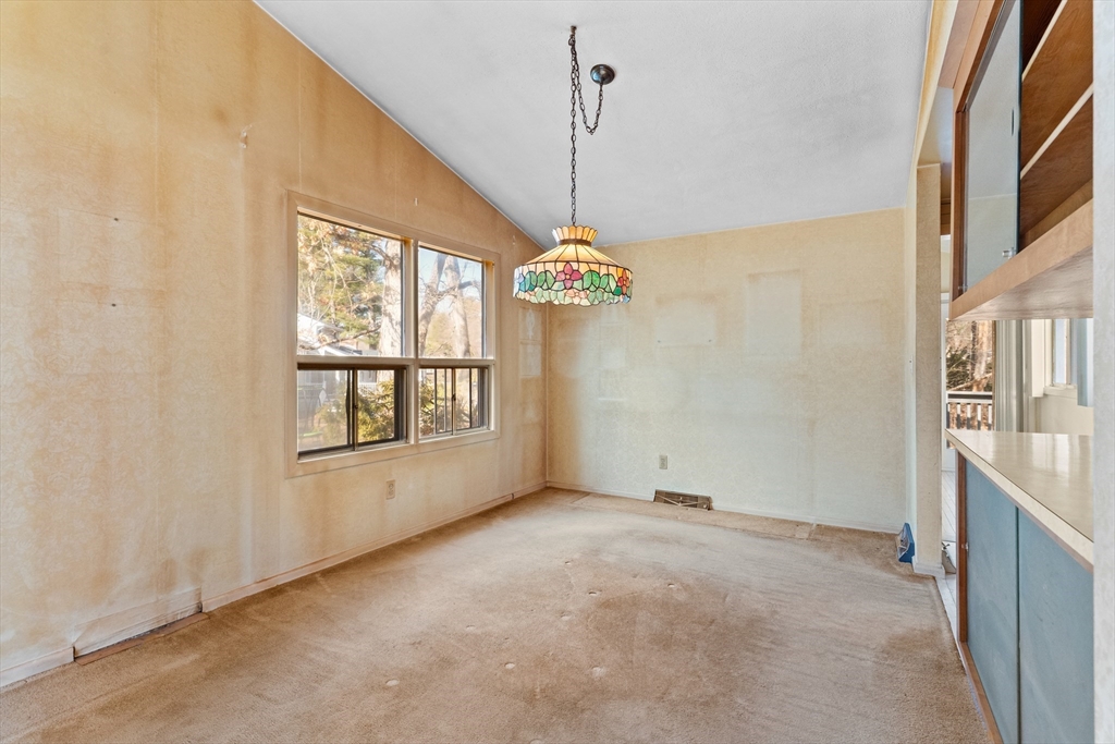 20 Joyce Road Framingham, MA 01701 - Photo 8 of 42 a view of an empty room with a window