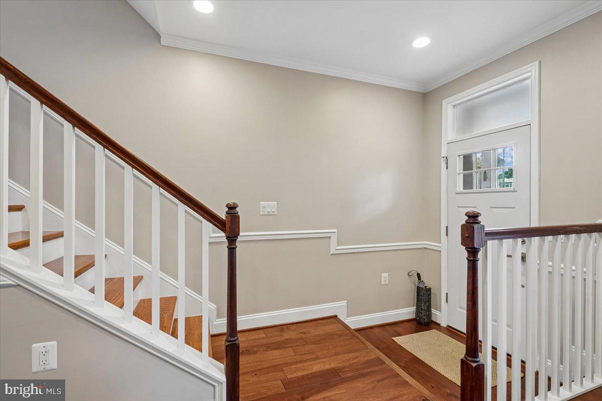 1203 Staples Street Northeast Washington, DC 20002 - Photo 7 of 51 Inviting entryway with elegant staircase.