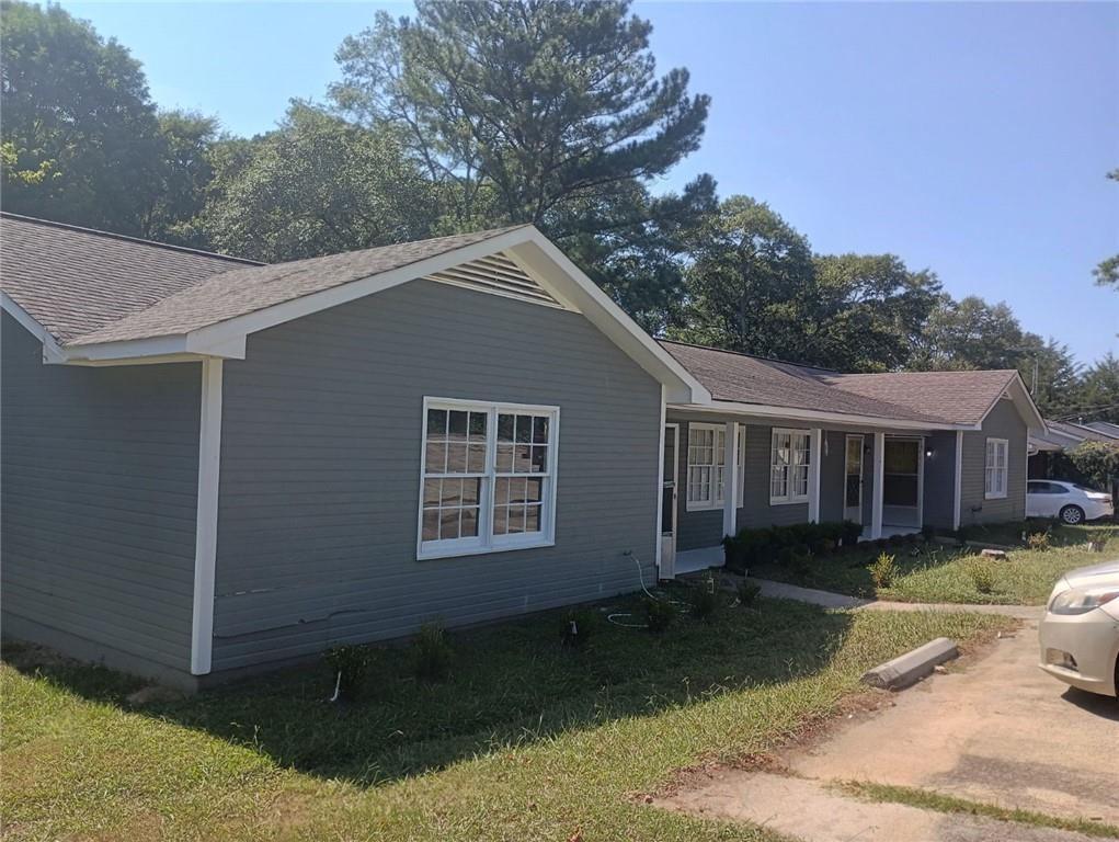 480 Cason Road Cedartown, GA 30125 - Photo 3 of 10 a front view of a house with garden