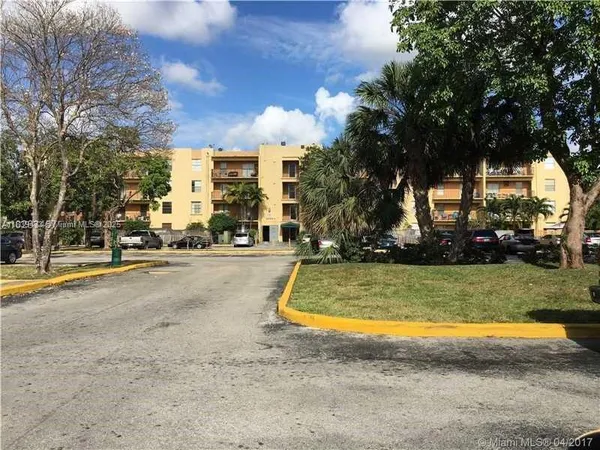 a view of yard with swimming pool