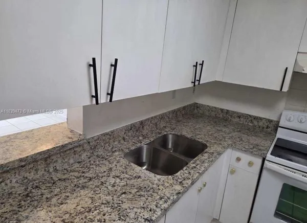 a view of hallway with stairs