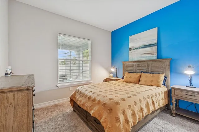 a living room with furniture and windows