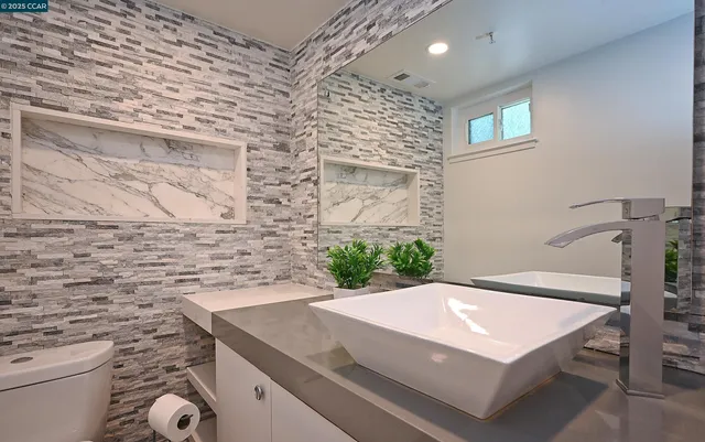 a bed room with a bed and a window