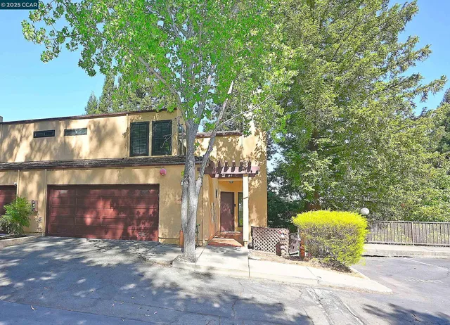 a building with trees in front of it