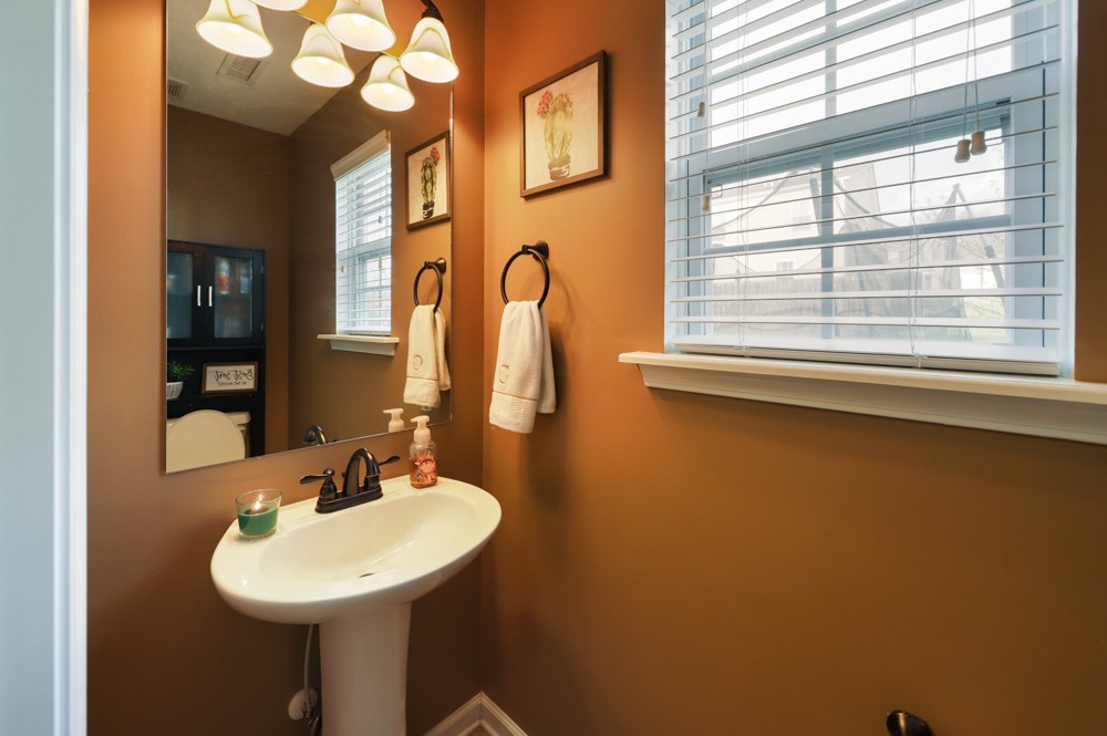 1080 Woodall Road Lebanon, TN 37090 - Photo 11 of 24 a bathroom with a sink and a mirror