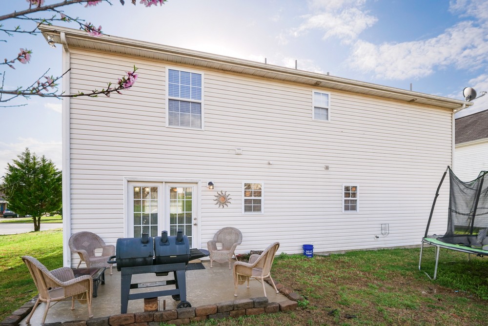 1080 Woodall Road Lebanon, TN 37090 - Photo 22 of 24 a backyard of a house with seating space