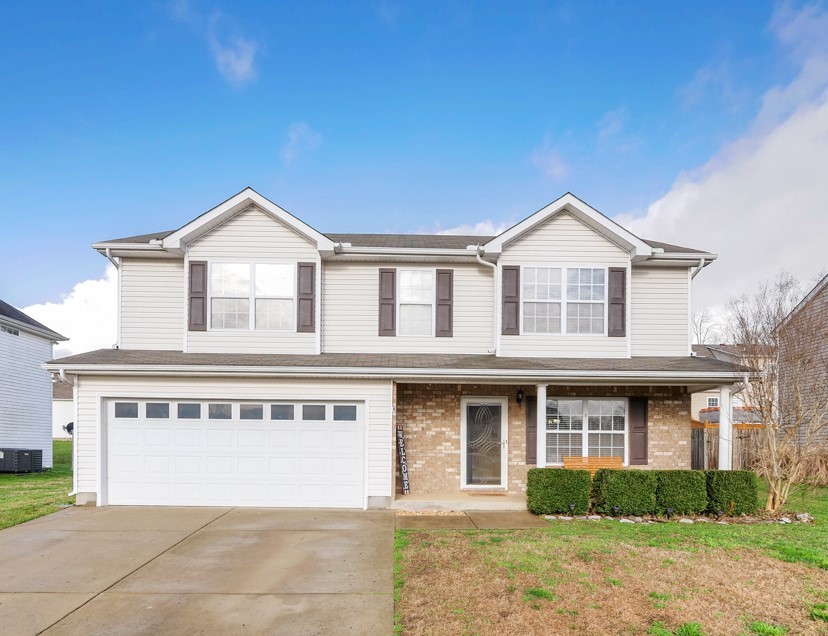 1080 Woodall Road Lebanon, TN 37090 - Photo 24 of 24 a front view of a house with garden