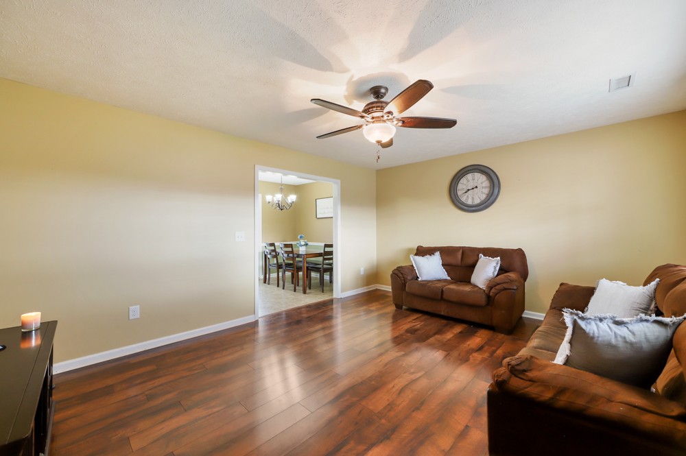 1080 Woodall Road Lebanon, TN 37090 - Photo 5 of 24 a living room with furniture and a wooden floor