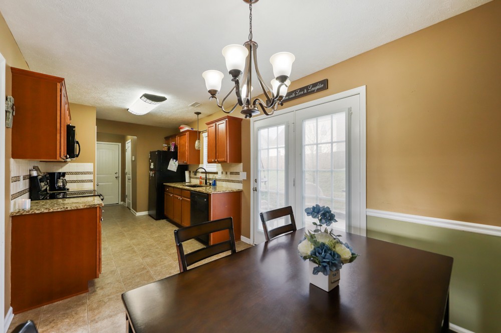 1080 Woodall Road Lebanon, TN 37090 - Photo 9 of 24 a kitchen with stainless steel appliances granite countertop counter space a sink appliances and cabinets