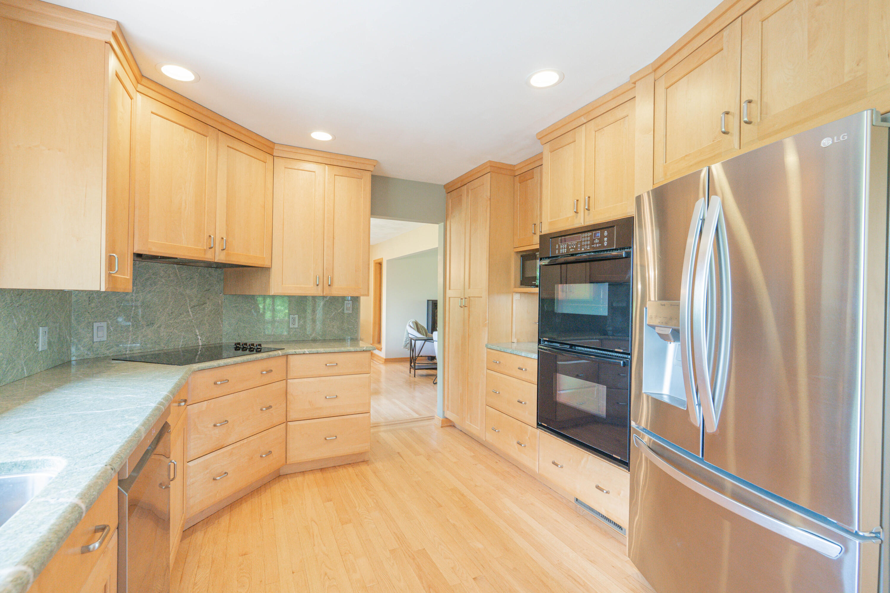 507 Shadowbrook Drive Tunkhannock, PA 18657 - Photo 19 of 57 a kitchen with stainless steel appliances a refrigerator and a stove