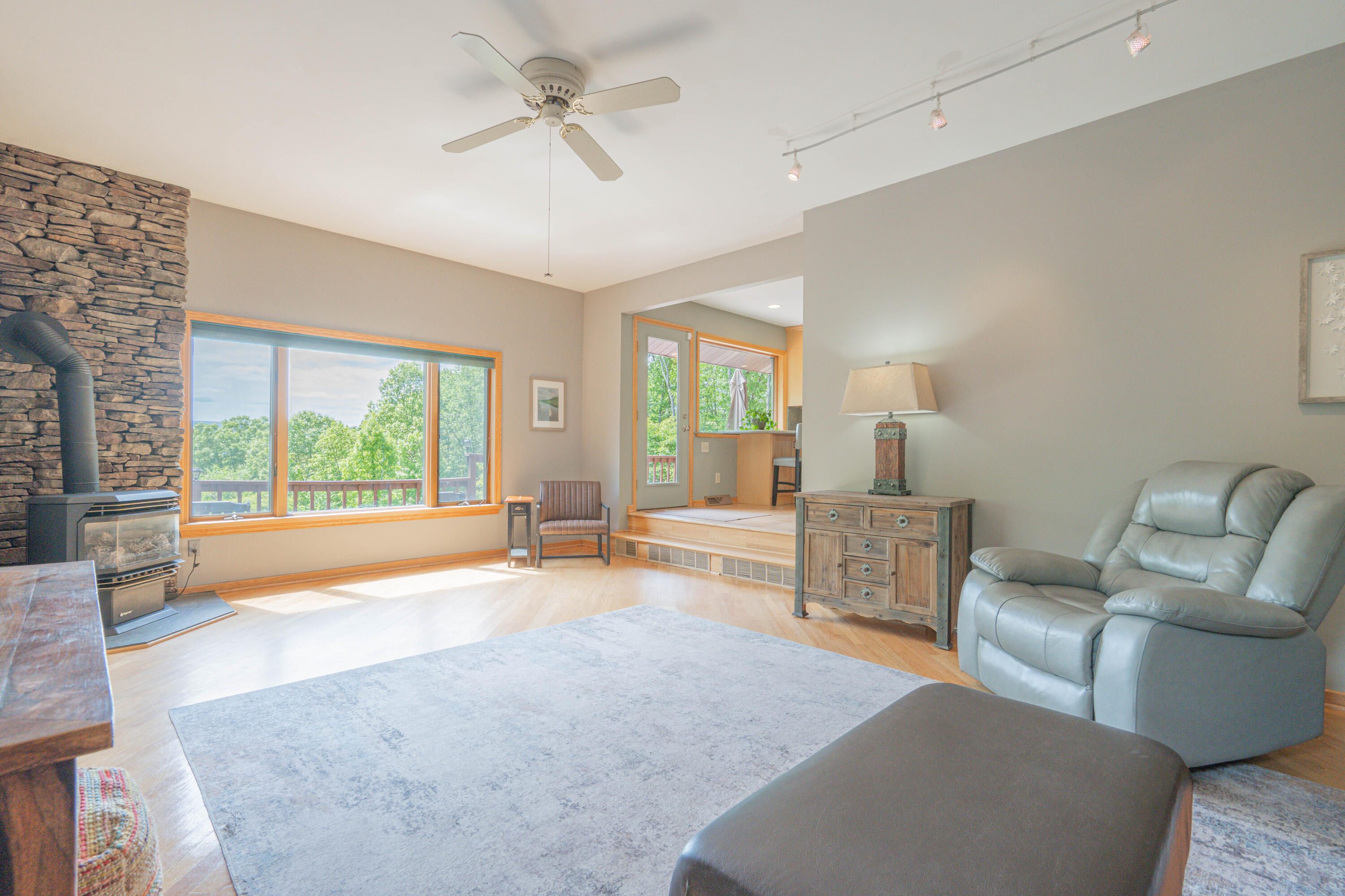 507 Shadowbrook Drive Tunkhannock, PA 18657 - Photo 22 of 57 a living room with furniture and a large window