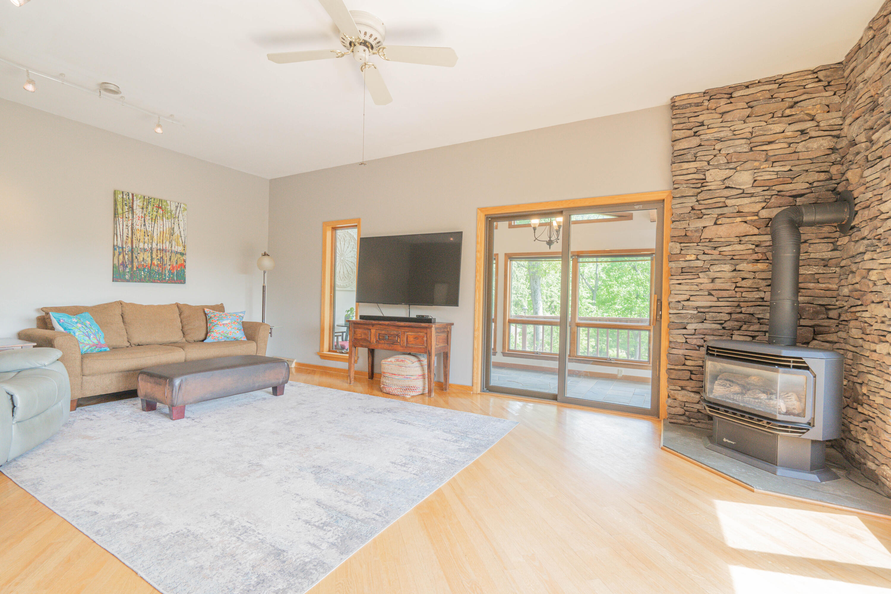 507 Shadowbrook Drive Tunkhannock, PA 18657 - Photo 23 of 57 a living room with furniture and a flat screen tv