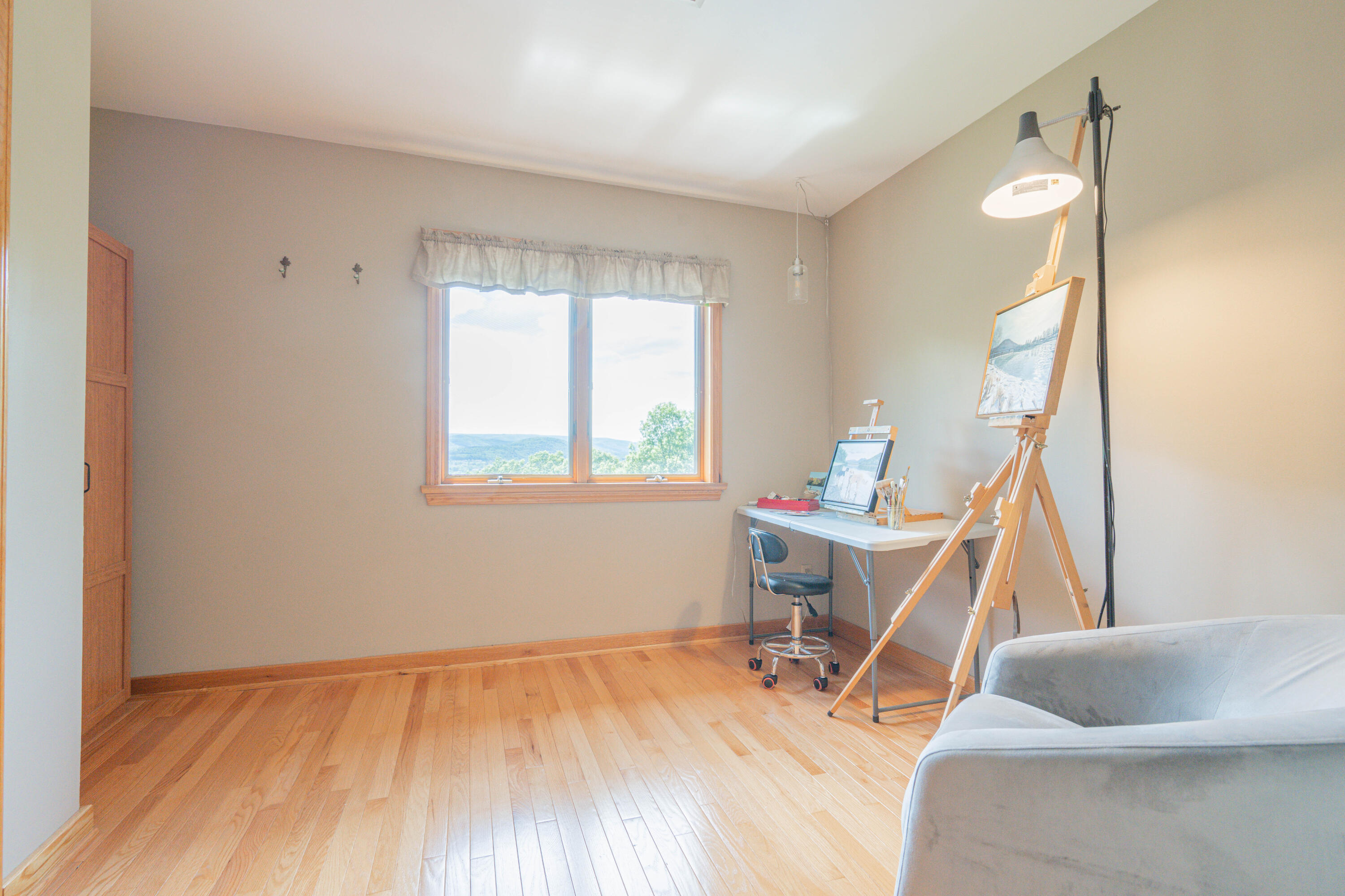 507 Shadowbrook Drive Tunkhannock, PA 18657 - Photo 33 of 57 a view of a room with wooden floor and a window