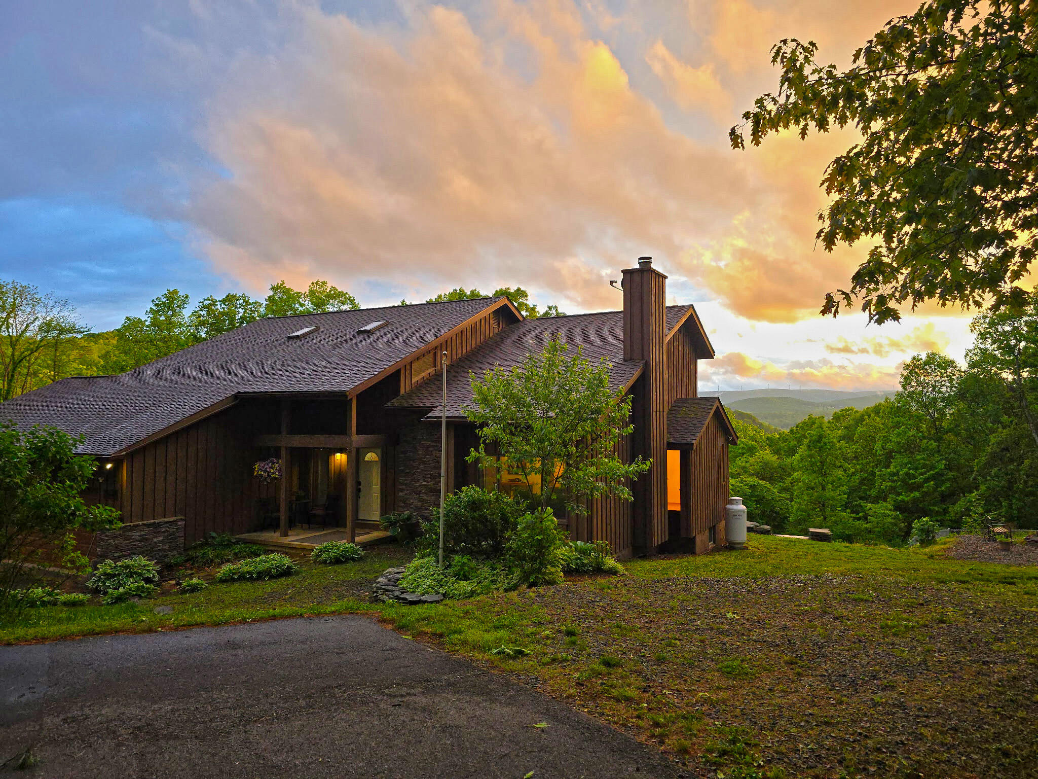 507 Shadowbrook Drive Tunkhannock, PA 18657 - Photo 50 of 57 a view of a house with a yard and a fountain