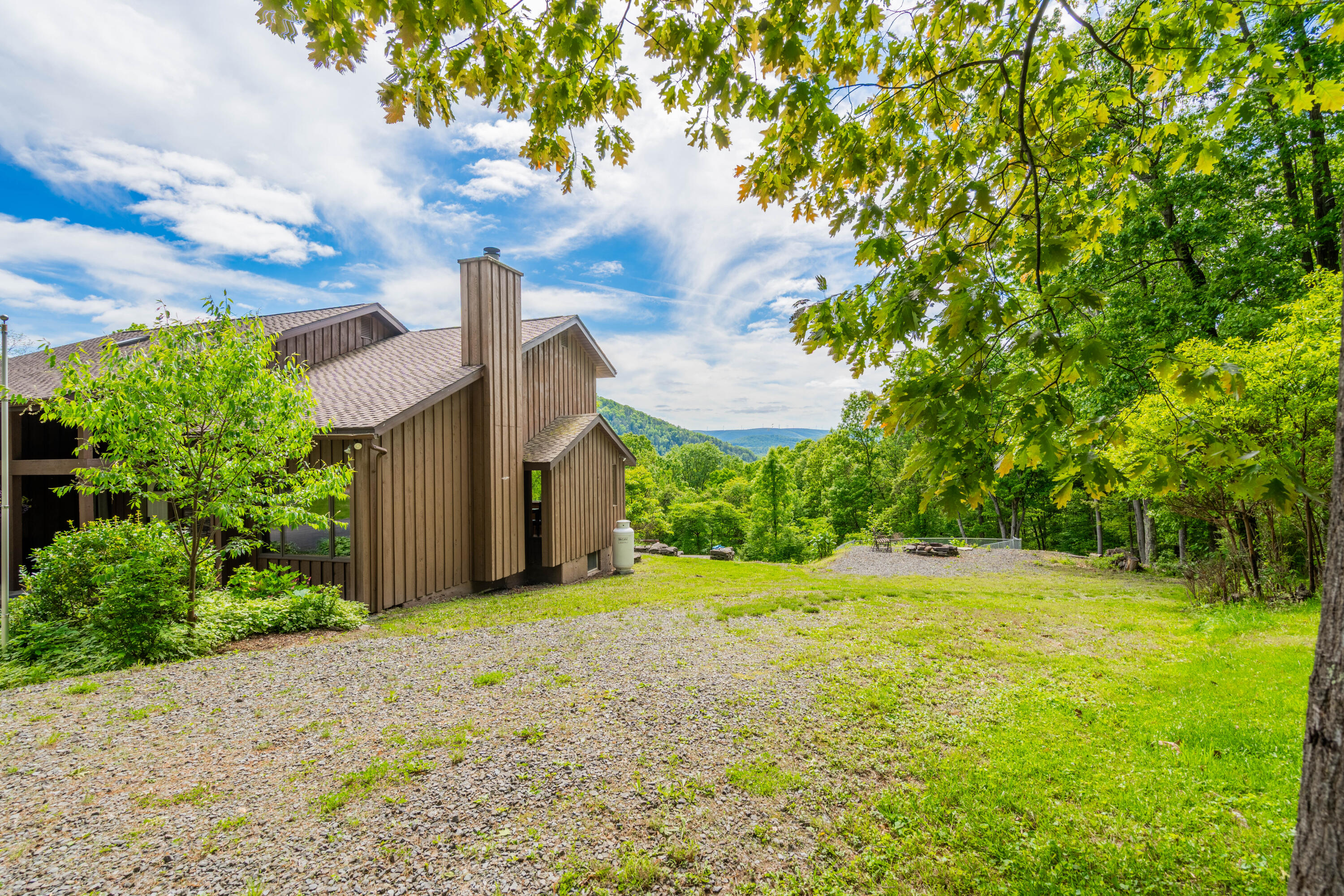507 Shadowbrook Drive Tunkhannock, PA 18657 - Photo 51 of 57 a view of a big yard with plants and large trees