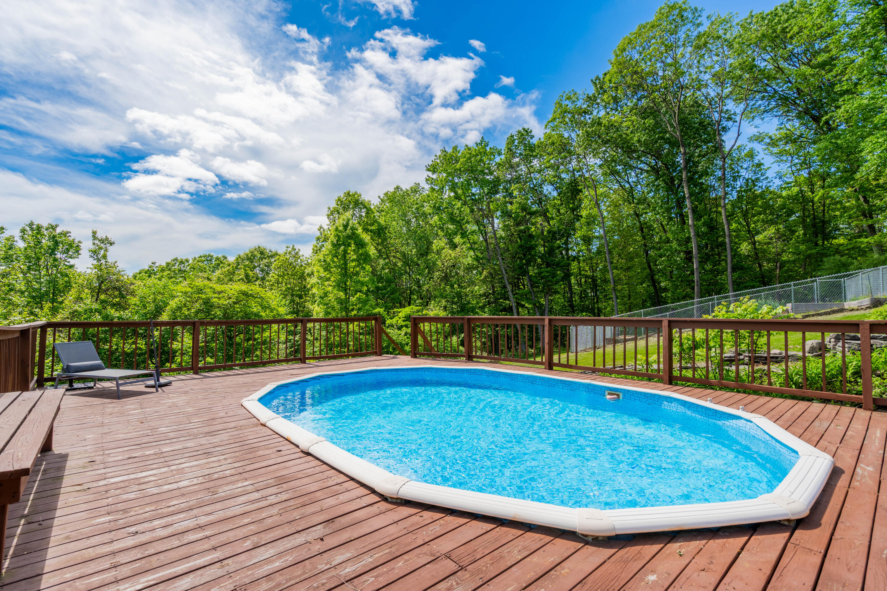 507 Shadowbrook Drive Tunkhannock, PA 18657 - Photo 7 of 57 a view of a swimming pool with a patio