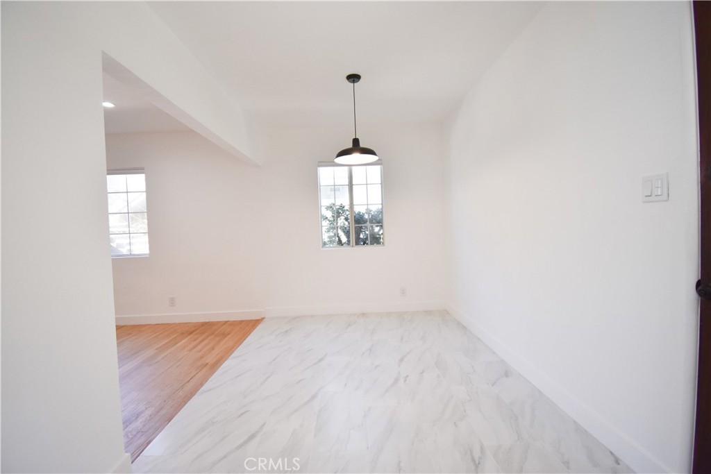 1570 North Verdugo Road, Unit B Glendale, CA 91208 - Photo 5 of 12 an empty room with windows