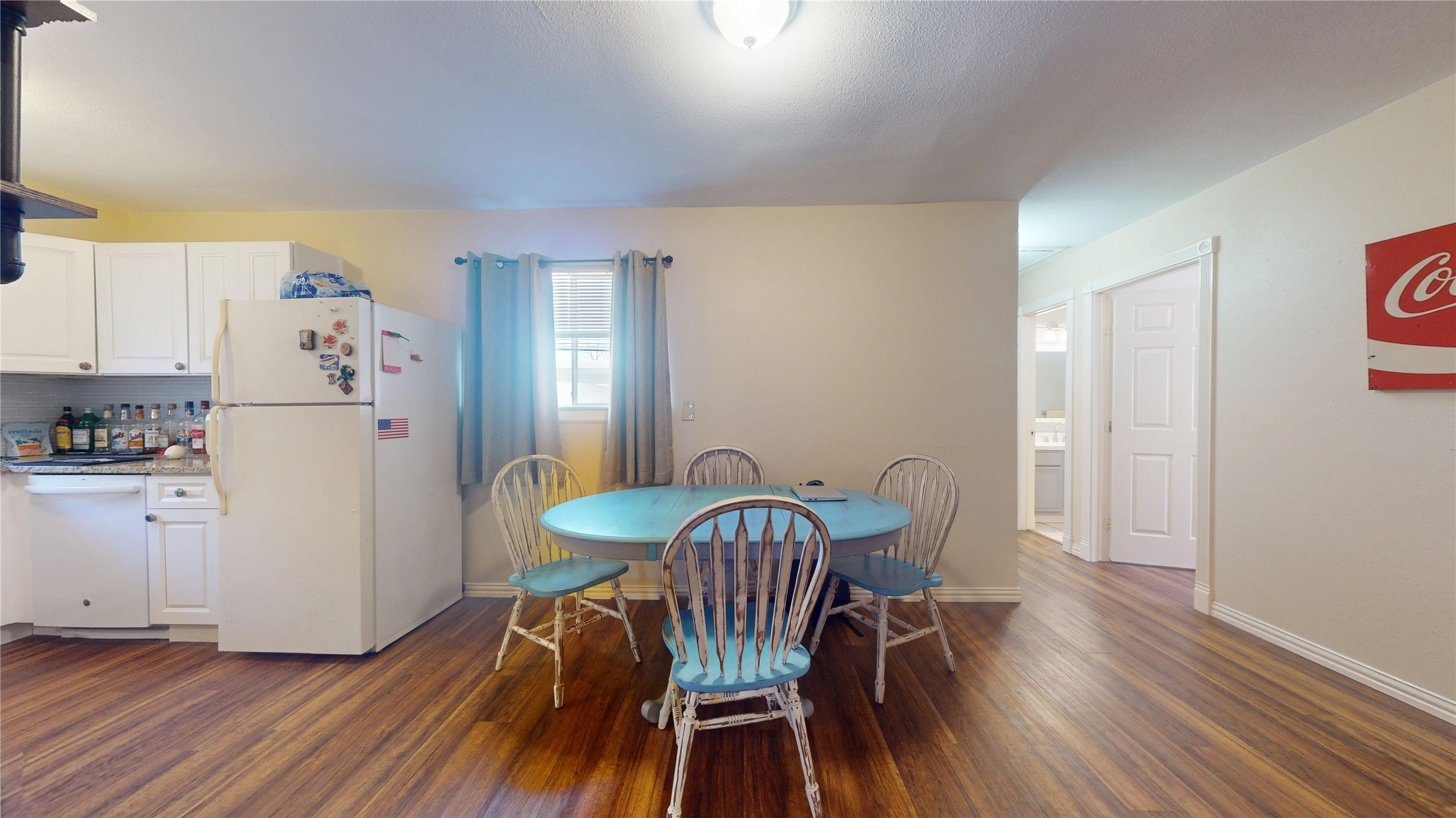 4713 Pine Street Pasadena, TX 77586 - Photo 13 of 38 a view of a dining room with furniture and wooden floor