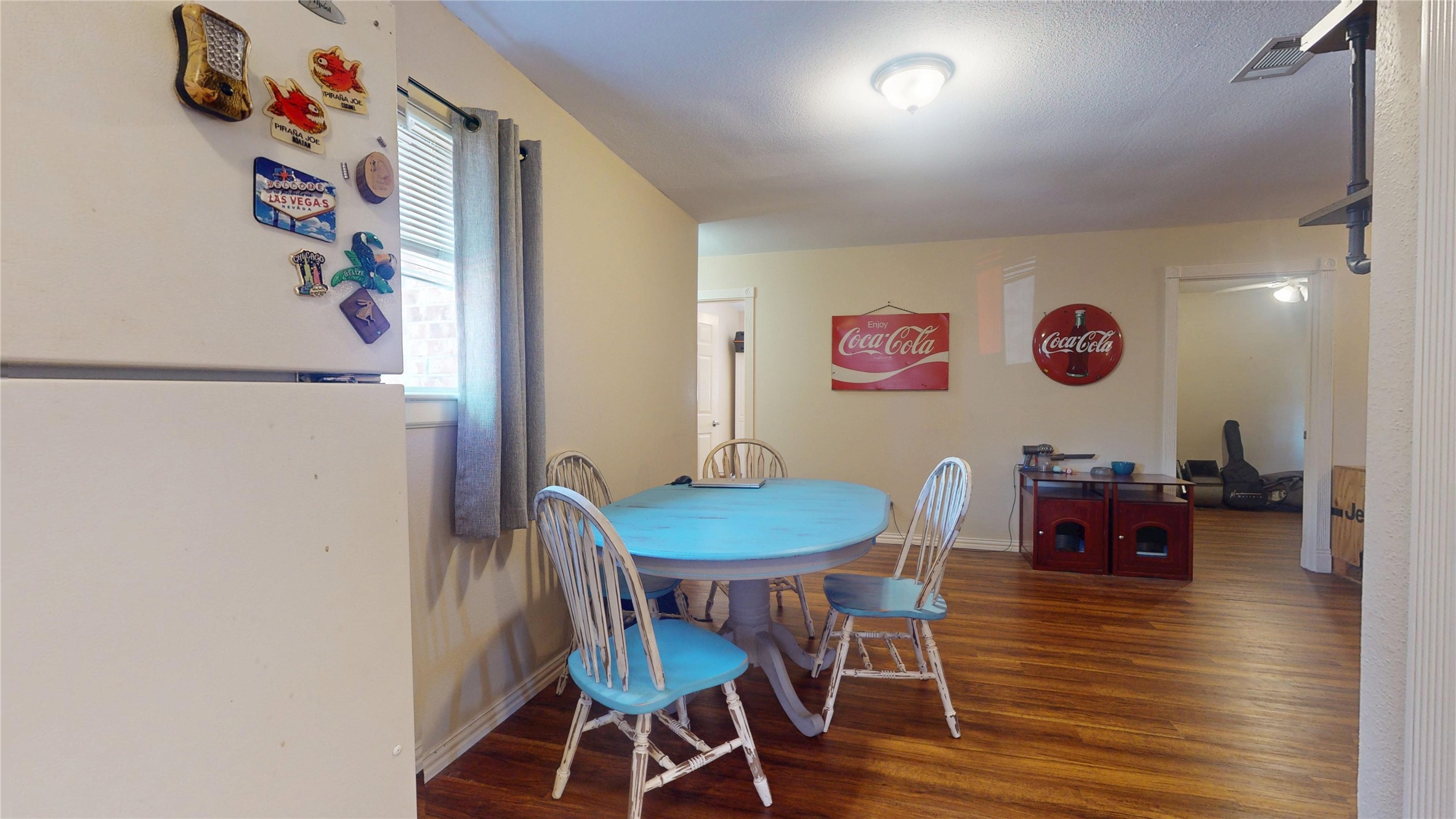 4713 Pine Street Pasadena, TX 77586 - Photo 18 of 38 a view of a dining room with furniture and wooden floor