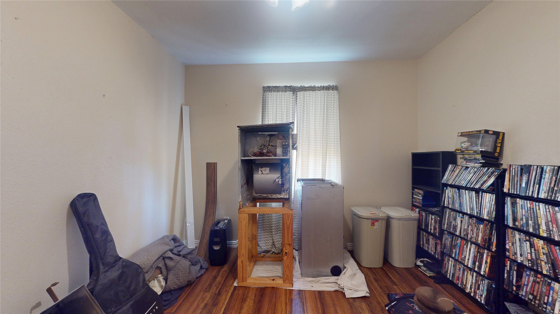 4713 Pine Street Pasadena, TX 77586 - Photo 20 of 38 a view of a workspace with furniture and wooden floor