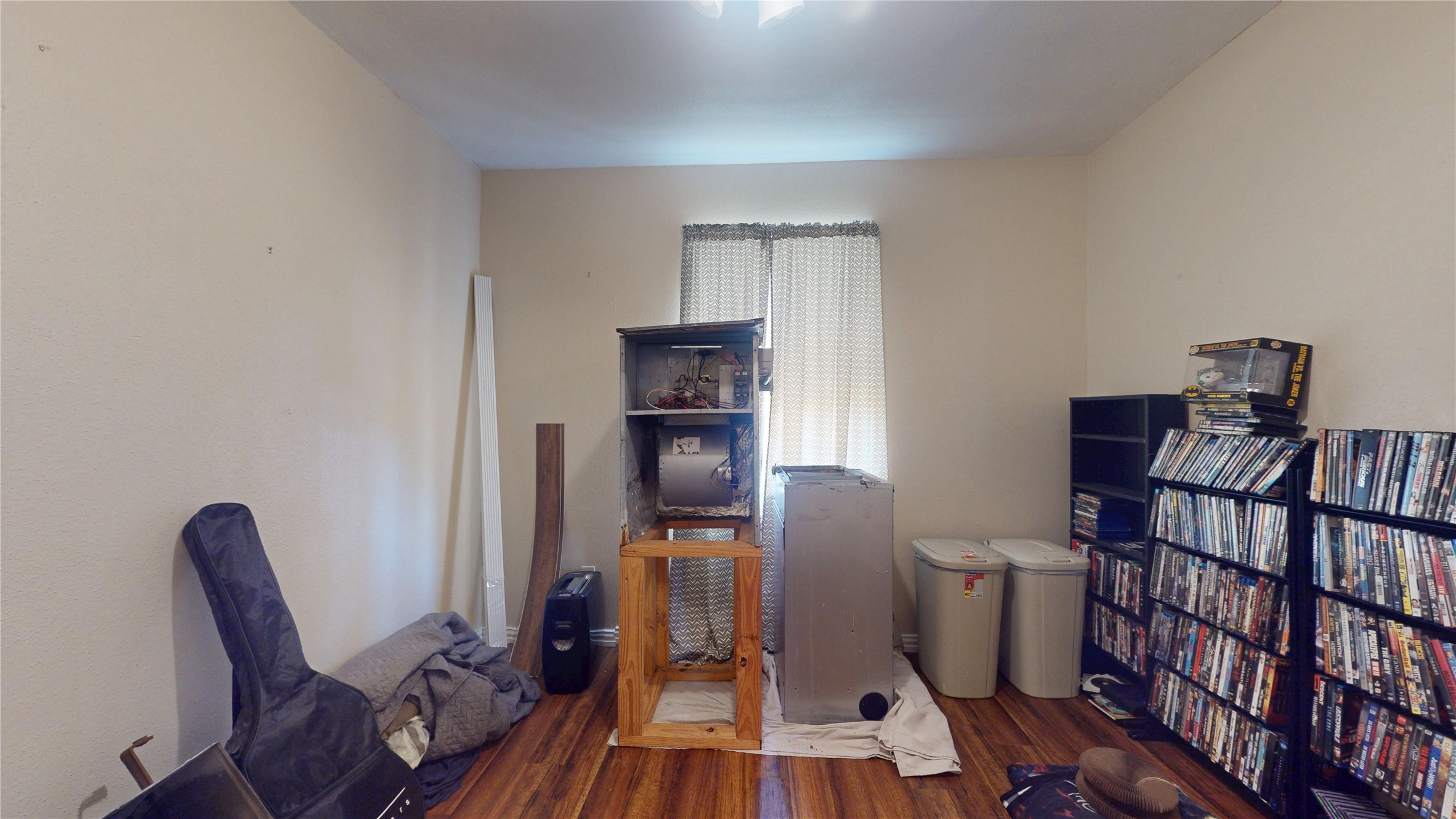 4713 Pine Street Pasadena, TX 77586 - Photo 21 of 38 a view of a workspace with furniture and wooden floor