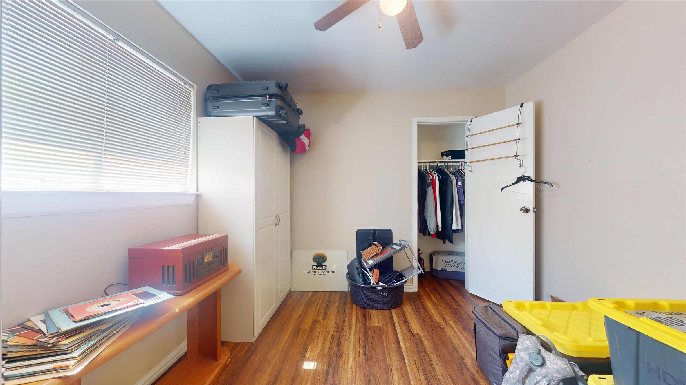 4713 Pine Street Pasadena, TX 77586 - Photo 23 of 38 a view of a bedroom with bed and wooden floor