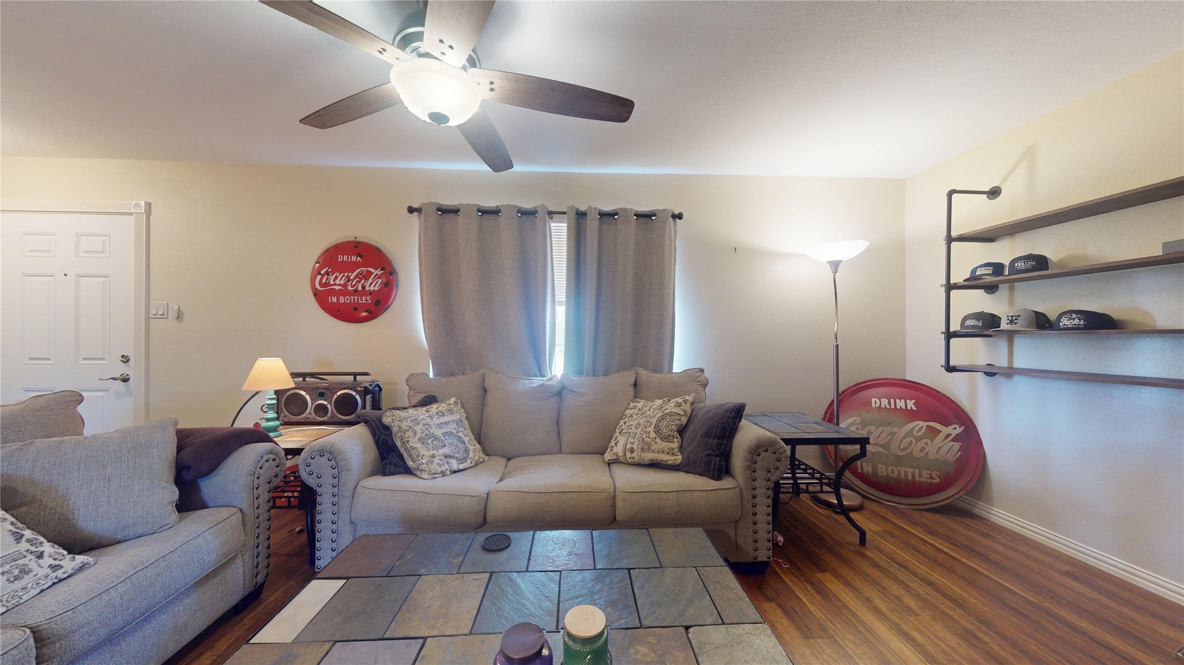 4713 Pine Street Pasadena, TX 77586 - Photo 9 of 38 a living room with furniture and a chandelier