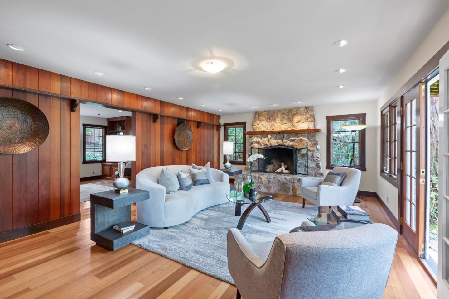 36 Skyline Drive Woodside, CA 94062 - Photo 11 of 67 a living room with furniture fireplace and a large window